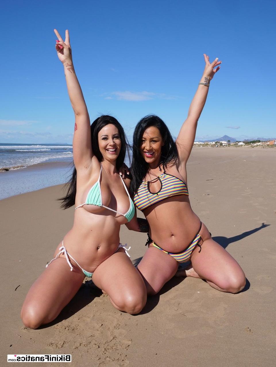 12P Curvy lesbians Candi Kayne and Ibi Smiles release their big boobs from bikinis