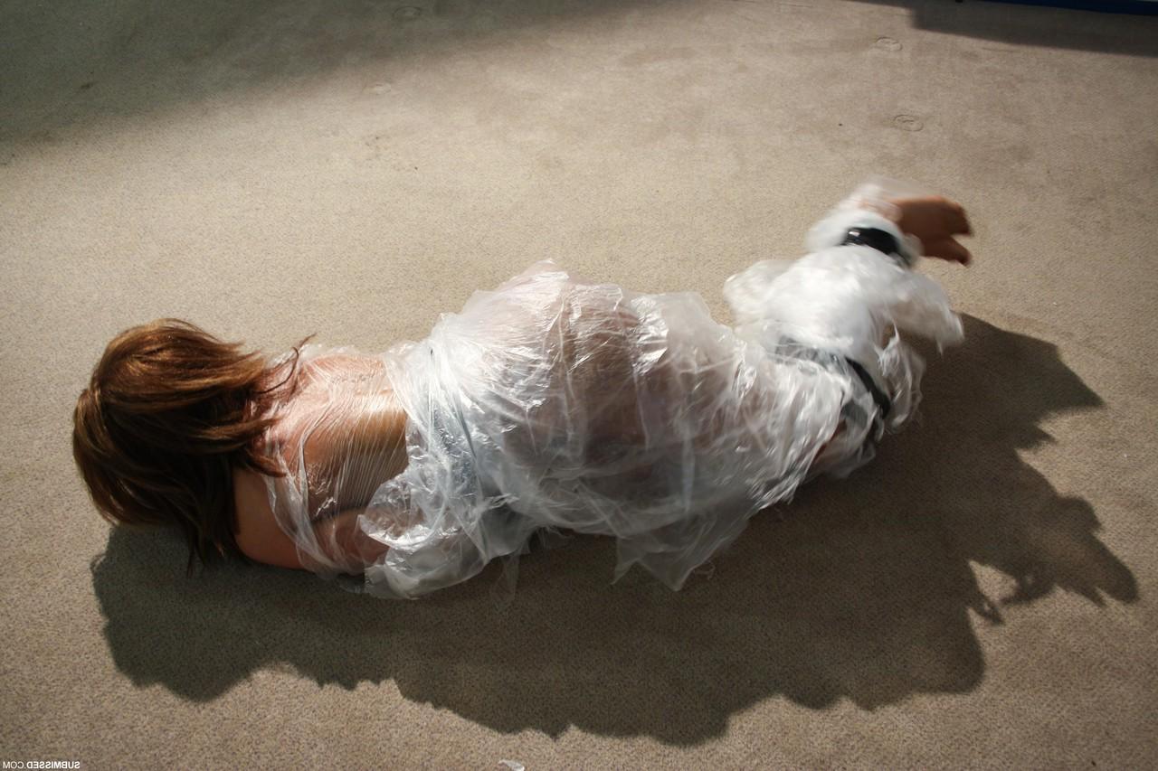 19P Poor slut Kayla moans while being covered in special plastic film
