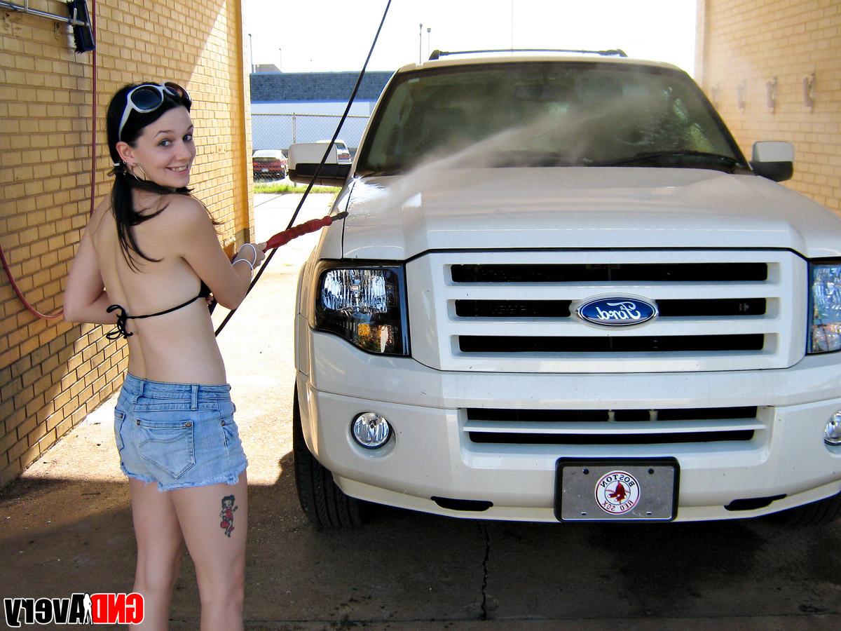 12P Cute brunette exposes a boob while washing a pickup truck at a car wash