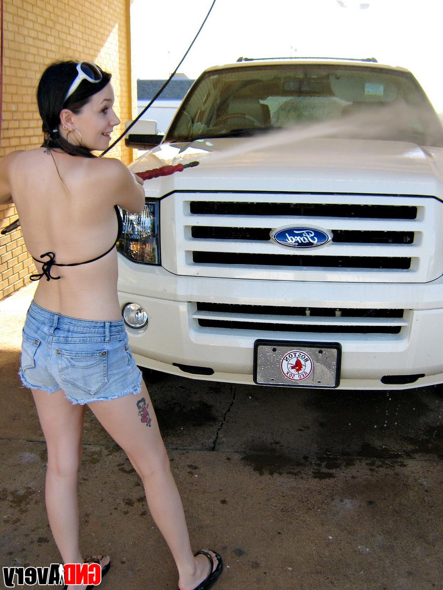 12P Cute brunette exposes a boob while washing a pickup truck at a car wash