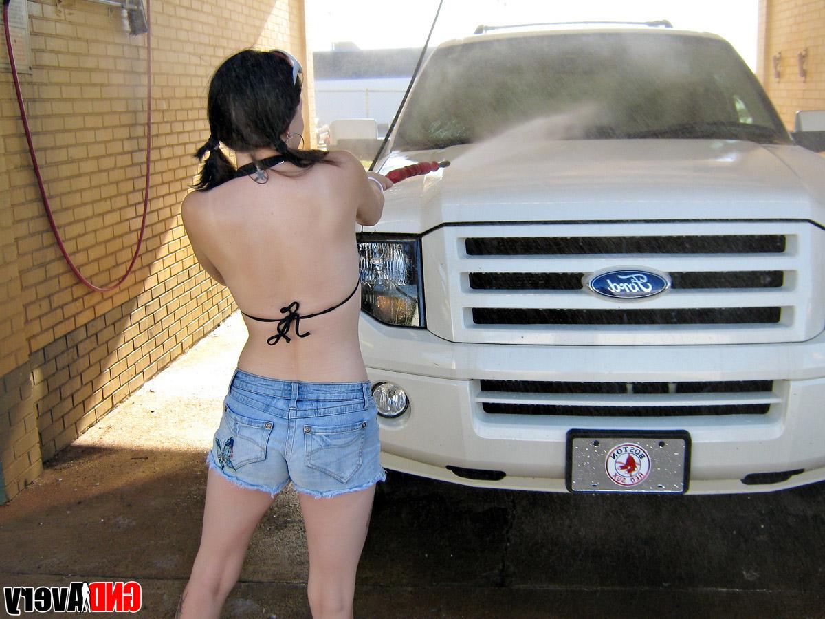 12P Cute brunette exposes a boob while washing a pickup truck at a car wash