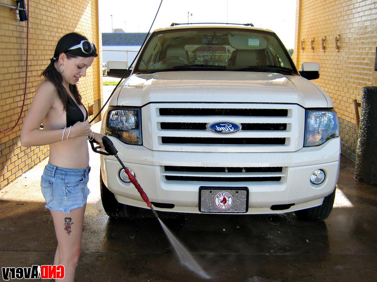 12P Cute brunette exposes a boob while washing a pickup truck at a car wash