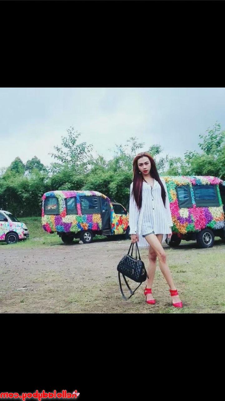 20P Pretty Asian ladyboy Sweetie poses in her hot outfits in her solo compilation