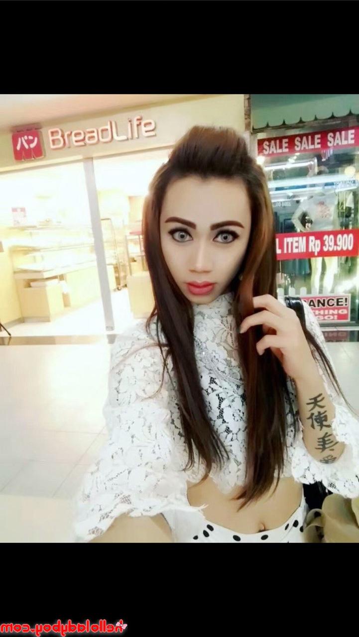 20P Pretty Asian ladyboy Sweetie poses in her hot outfits in her solo compilation