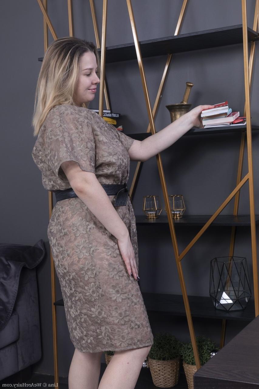20P Chubby blonde with a big ass Lina takes her clothes off & toys her hairy muff