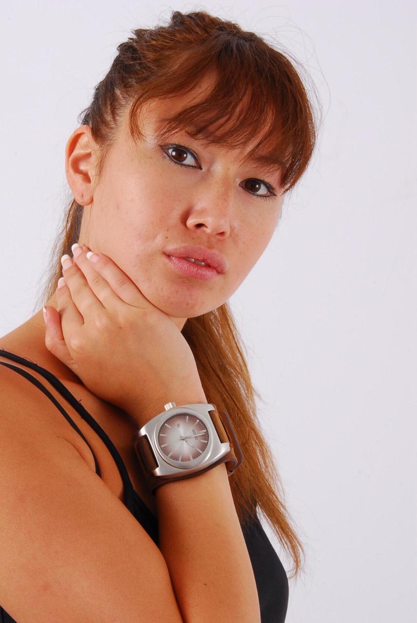 16P Asian redhead Evita wears a huge OOZOO cuff watch during non-nude action