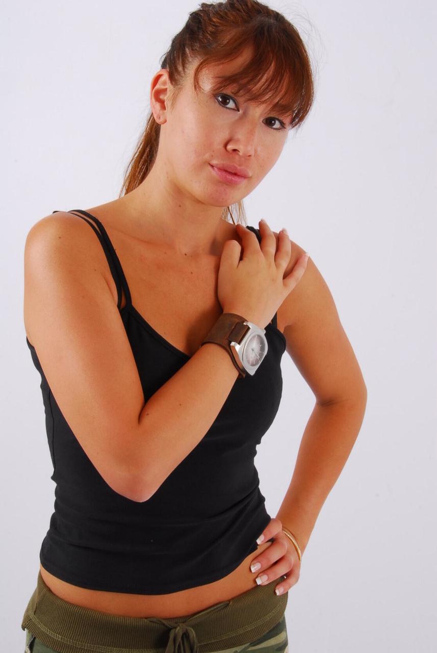 16P Asian redhead Evita wears a huge OOZOO cuff watch during non-nude action