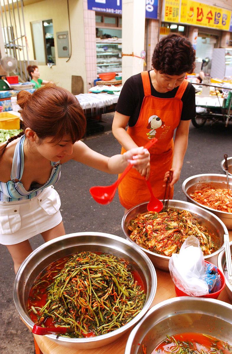 16P Japanese redhead An Naba samples street food before a nude solo shoot