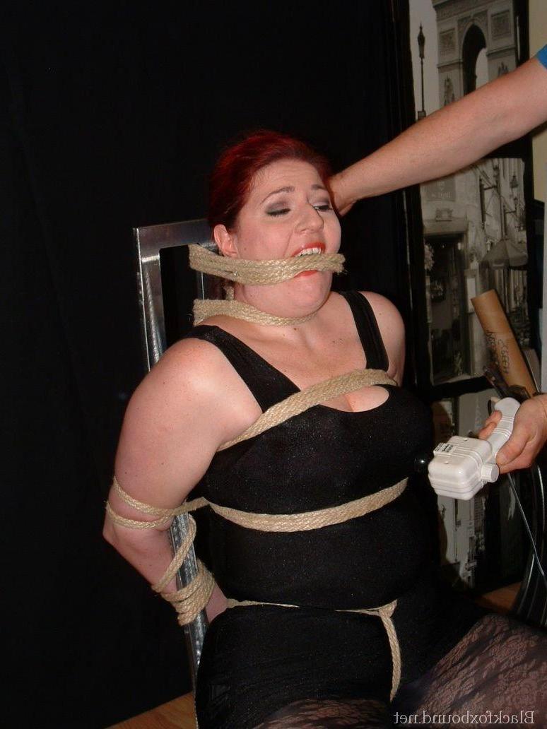 16P Overweight redhead is threatened with a knife while tied to a chair