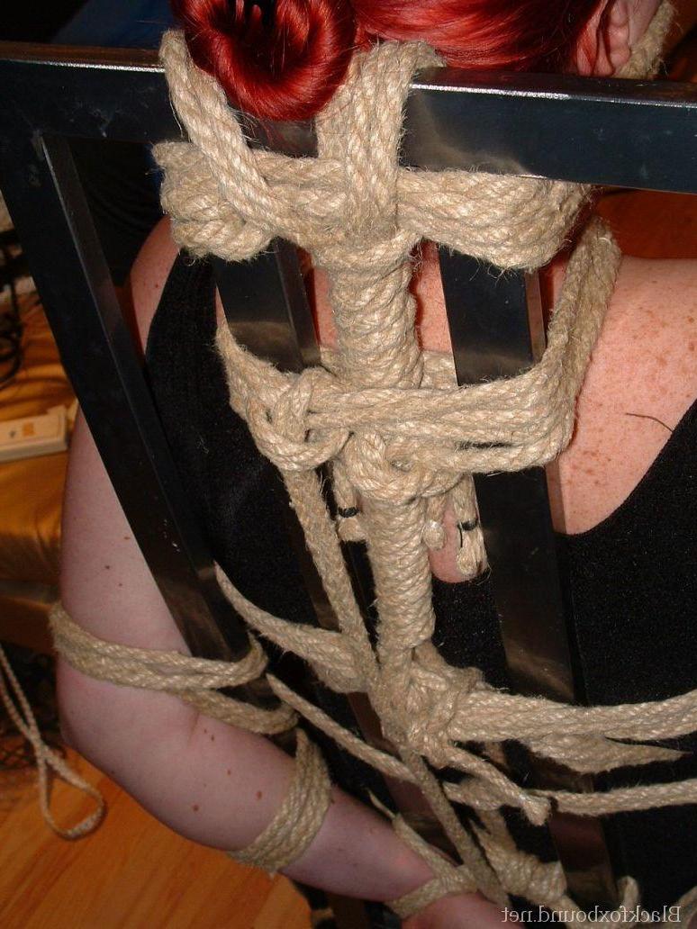 16P Overweight redhead is threatened with a knife while tied to a chair