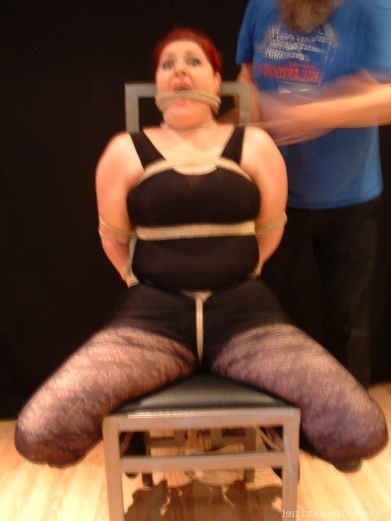 16P Overweight redhead is threatened with a knife while tied to a chair