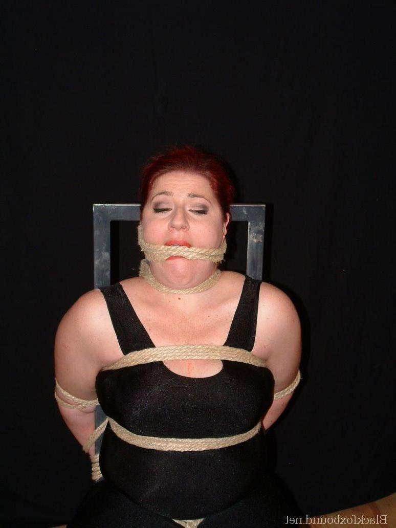 16P Overweight redhead is threatened with a knife while tied to a chair