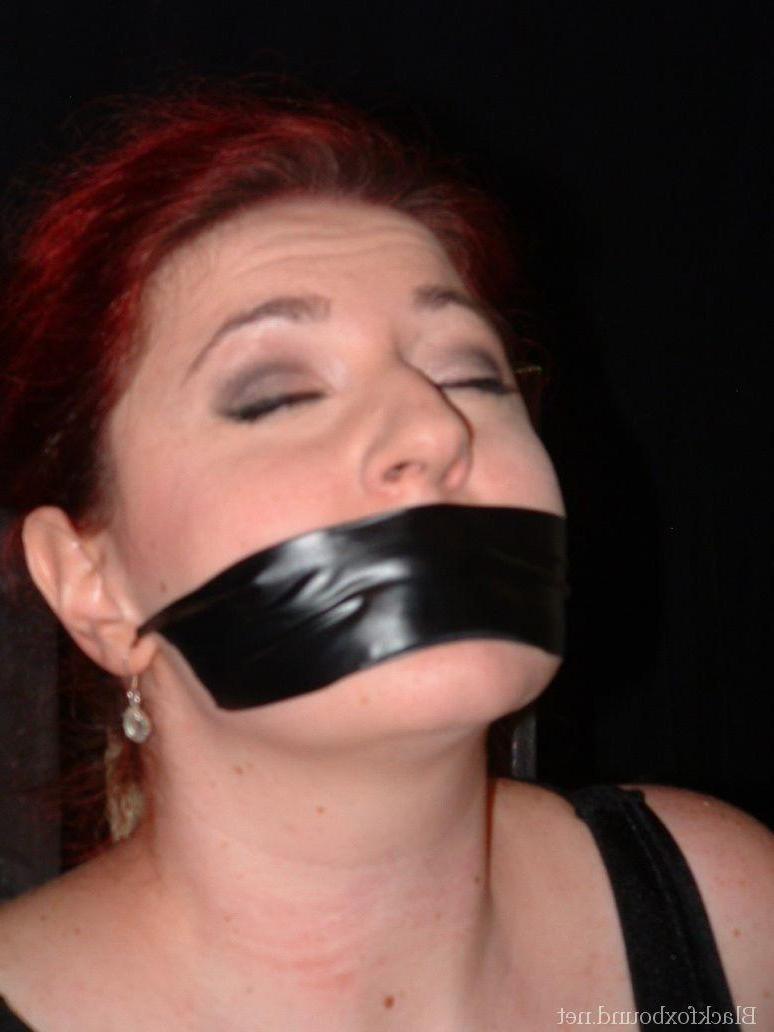 16P Overweight redhead is threatened with a knife while tied to a chair