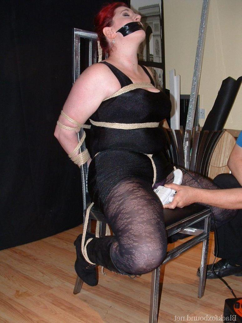 16P Overweight redhead is threatened with a knife while tied to a chair