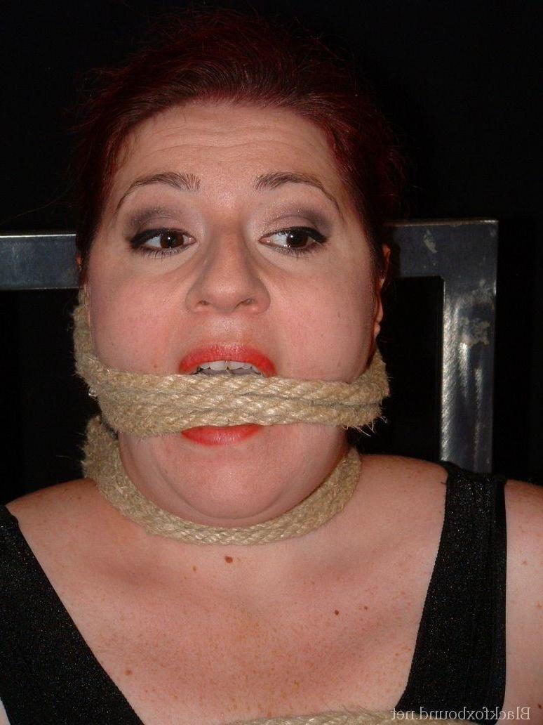 16P Overweight redhead is threatened with a knife while tied to a chair