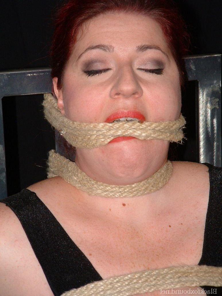 16P Overweight redhead is threatened with a knife while tied to a chair
