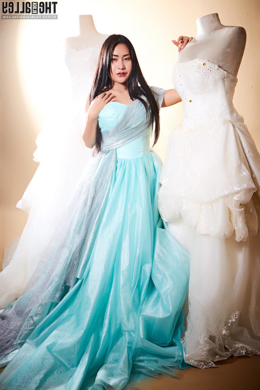 16P Beautiful Asian chick Linlin frees her big tits and moist pussy from a gown