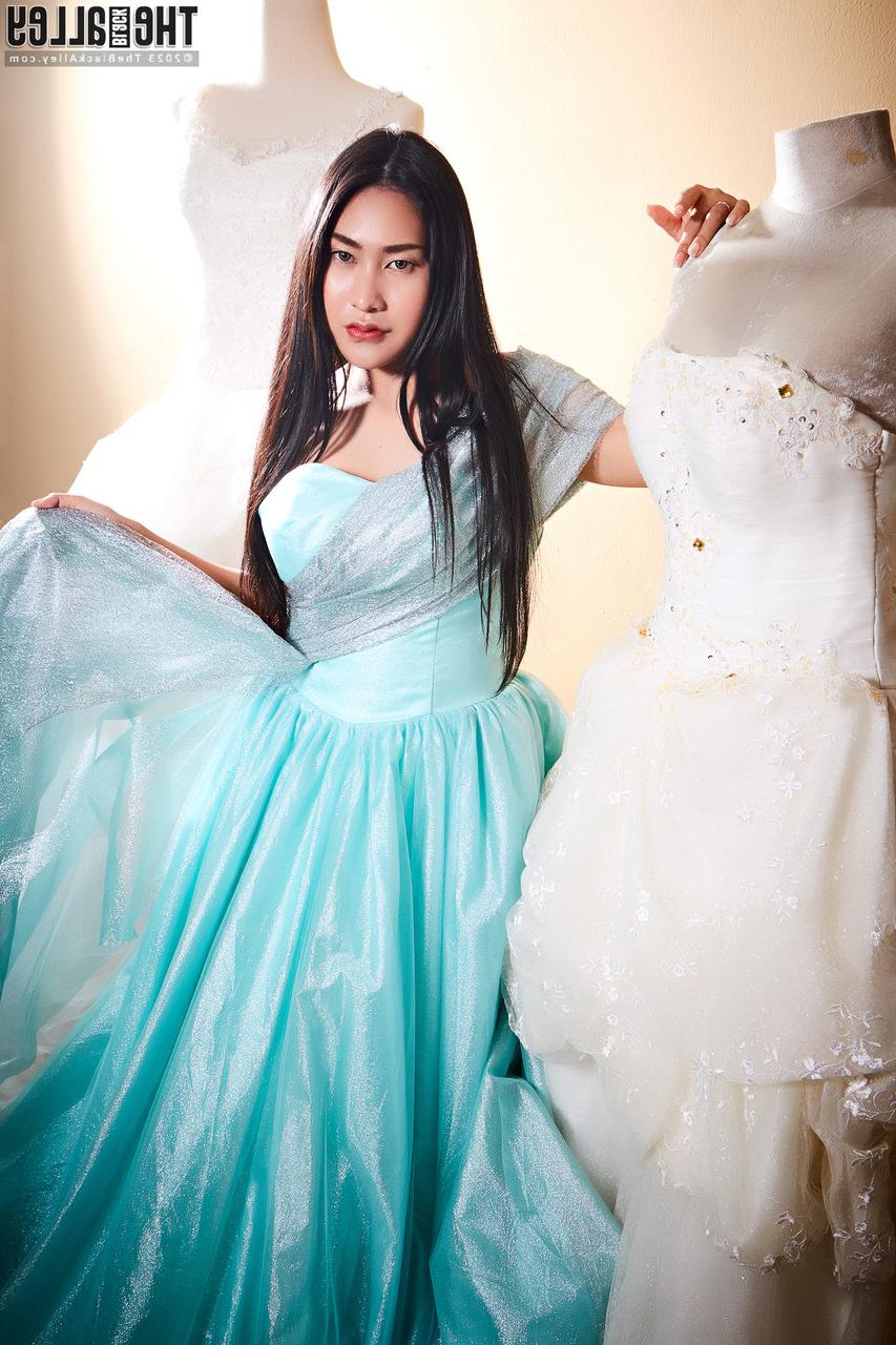 16P Beautiful Asian chick Linlin frees her big tits and moist pussy from a gown