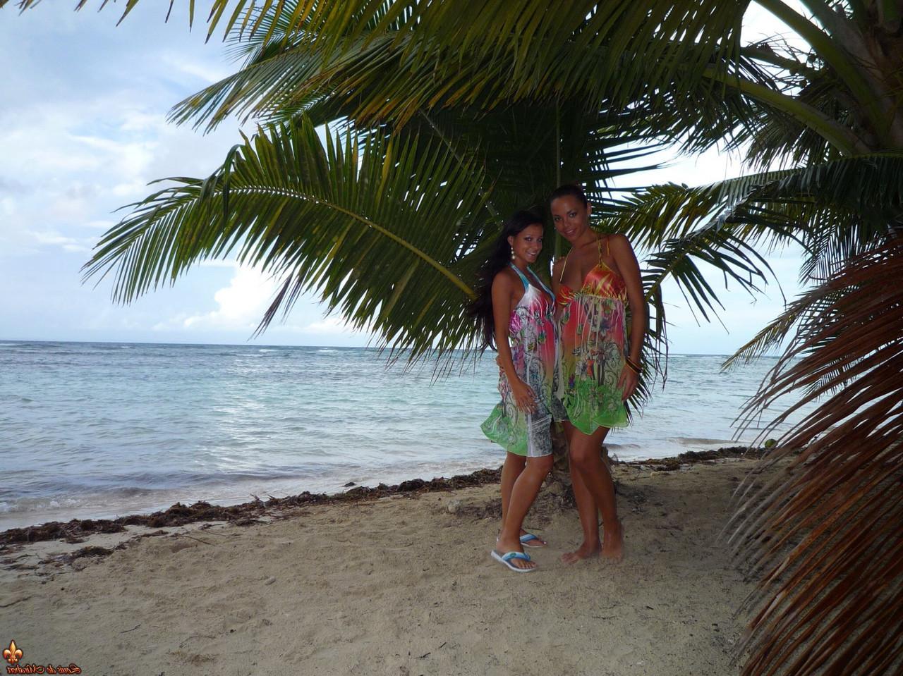 12P Beach babes poses for a topless gig on a deserted tropical beach
