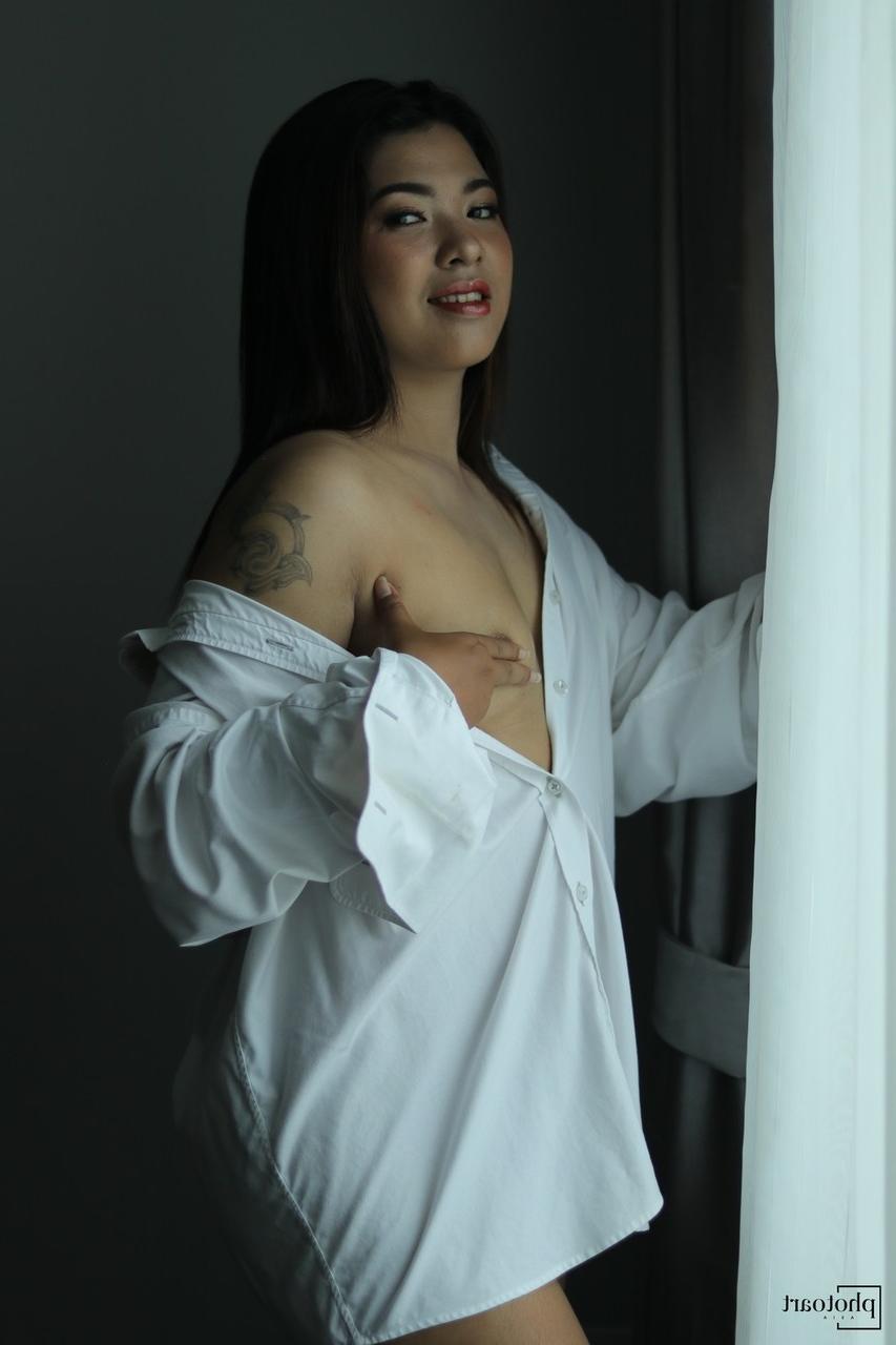 14P Beautiful Asian babe flashes her tiny tits while teasing in a shirt