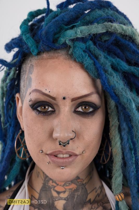 20P Punk girl with a headful of dyed dreads stands naked in her modelling debut