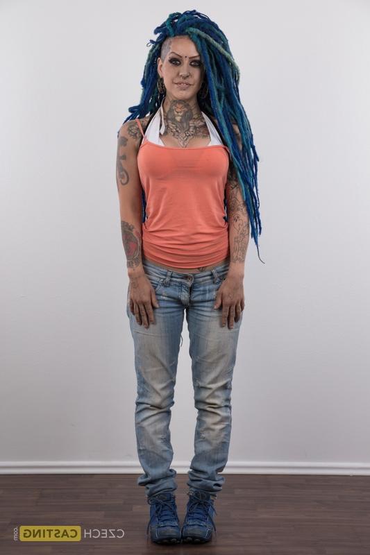 20P Punk girl with a headful of dyed dreads stands naked in her modelling debut