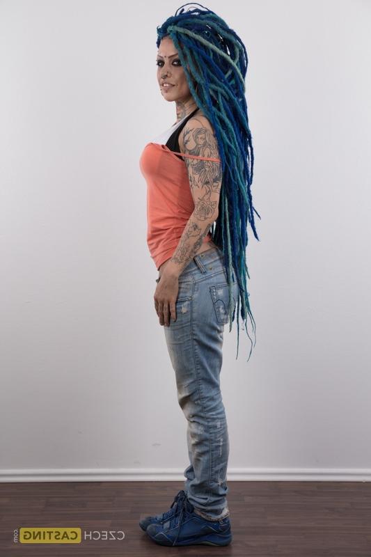20P Punk girl with a headful of dyed dreads stands naked in her modelling debut