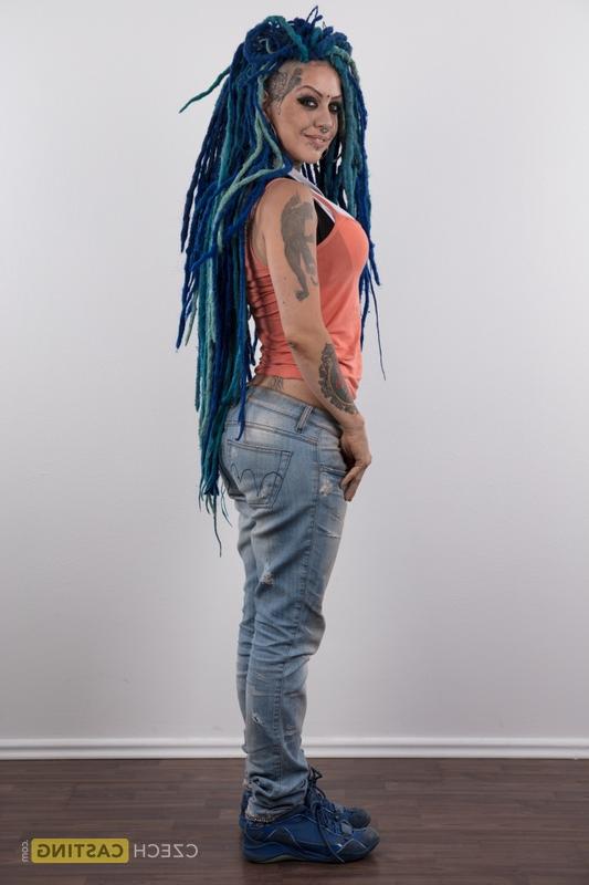20P Punk girl with a headful of dyed dreads stands naked in her modelling debut