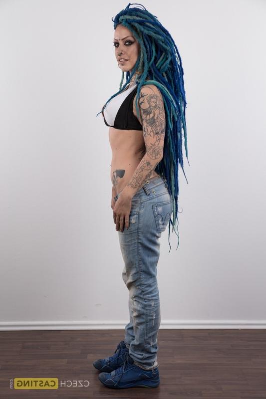 20P Punk girl with a headful of dyed dreads stands naked in her modelling debut