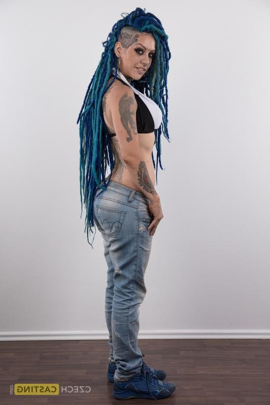 20P Punk girl with a headful of dyed dreads stands naked in her modelling debut