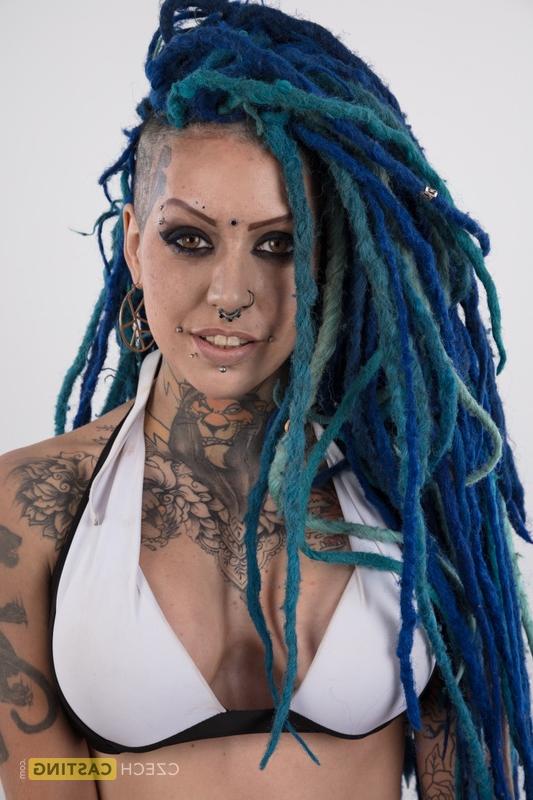 20P Punk girl with a headful of dyed dreads stands naked in her modelling debut