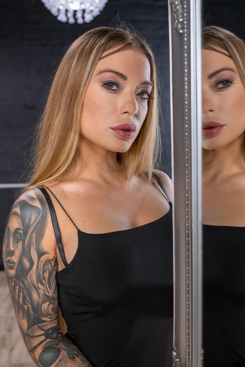 19P Horny babe with a tattooed arm Misha Maver rides a huge black cock