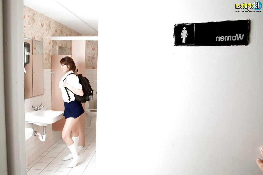 16P Teen babe Holly Michaels pulls up her skirt and strips in the bath
