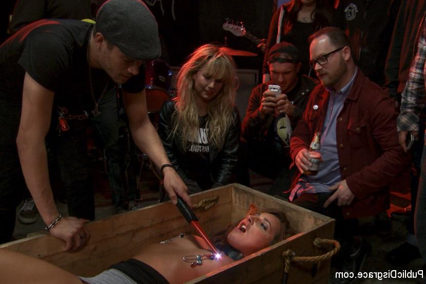 12P Redheaded girl is shocked with electricity during a public gangbang