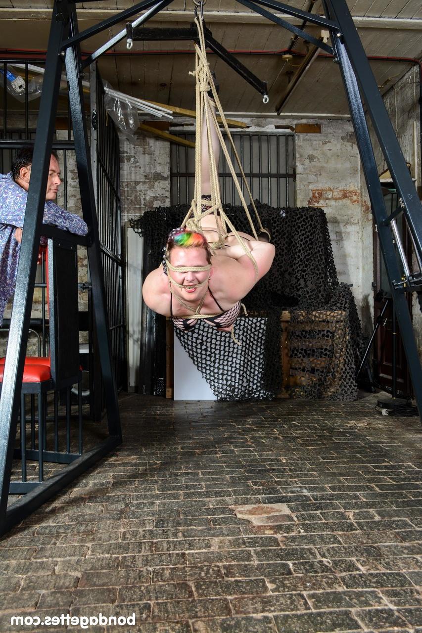 20P Chubby nerdy female Bunny gets tied up and hang on the ceiling in fishnets