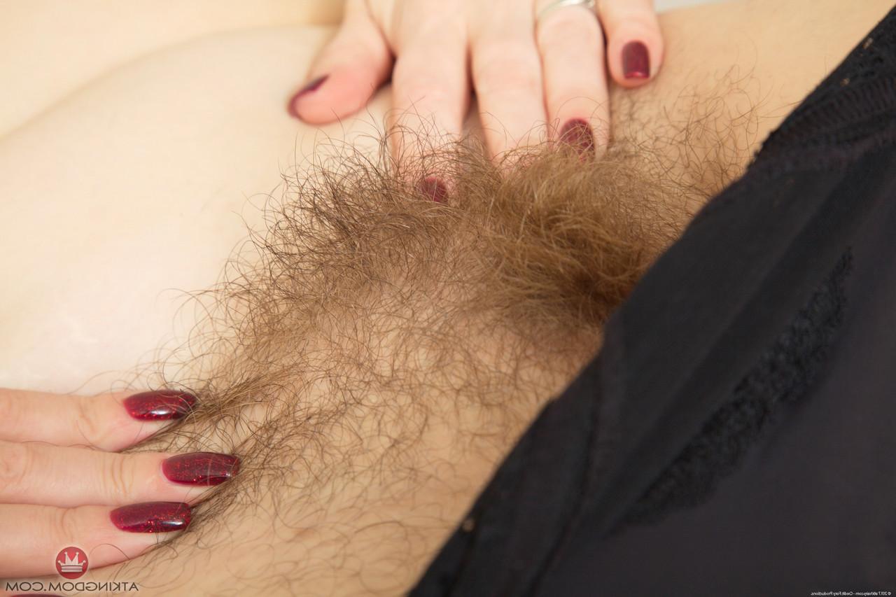 20P Chubby MILF Katrin Porto takes off her clothes & spreads her hairy pussy