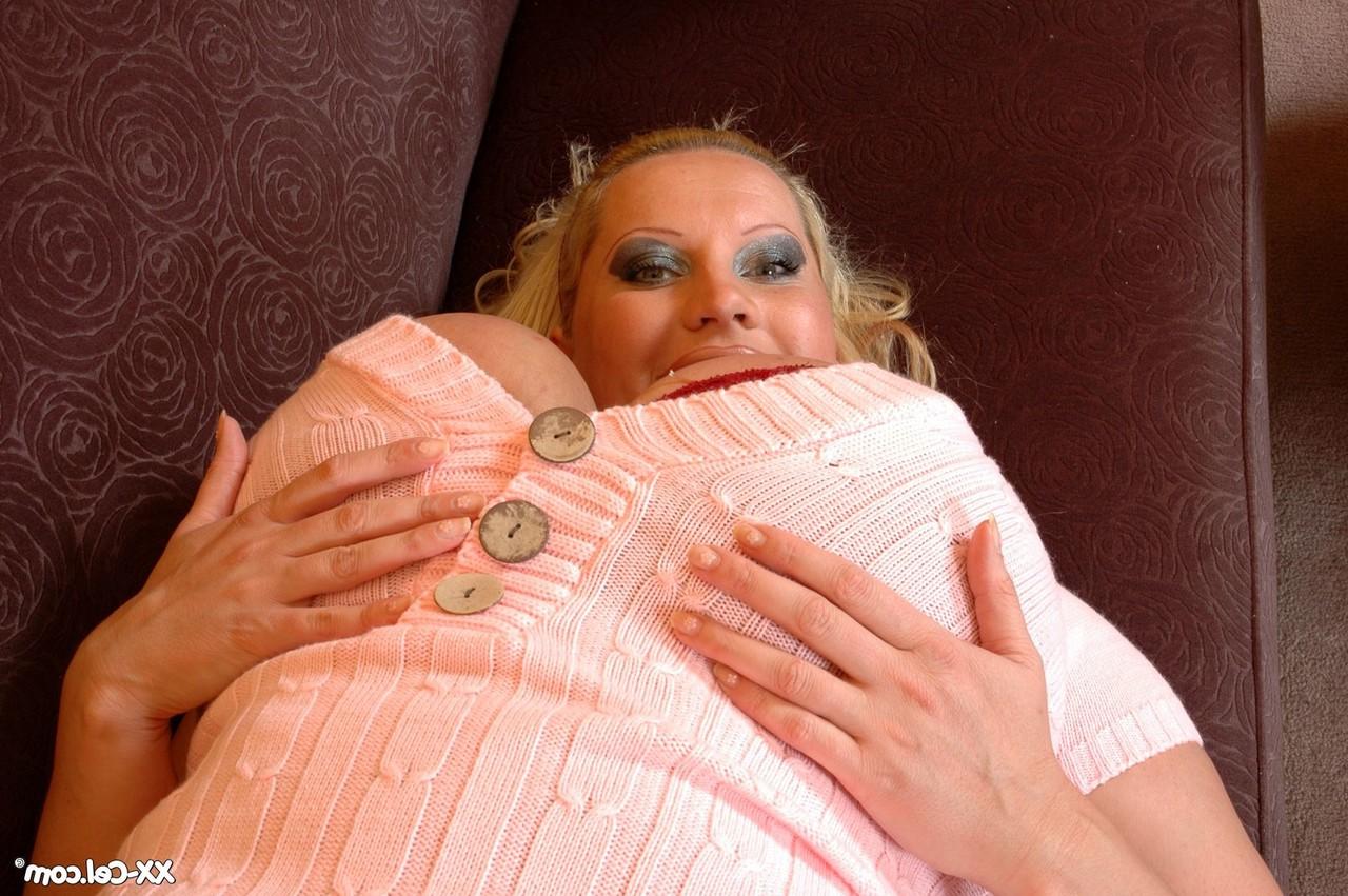 20P Plump MILF Laura Orsolya showing off her big natural breasts in stockings