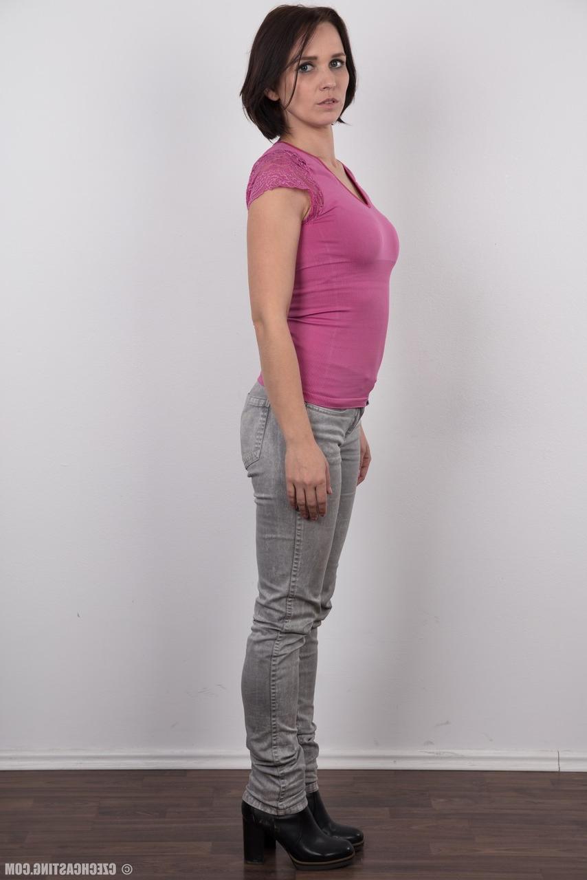 20P First timer Eli stands fully clothed before getting totally naked on a stool
