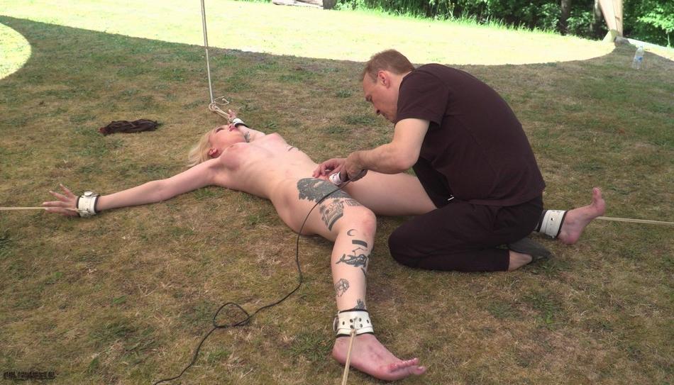 15P Submissive blonde is worked over by a sadist in a yard before giving a BJ