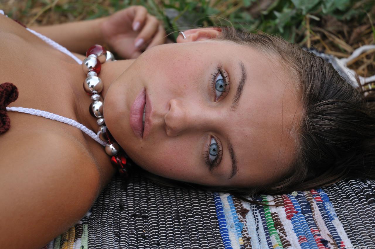 20P Babe with beautiful breasts Katarina B teases with her body outdoors