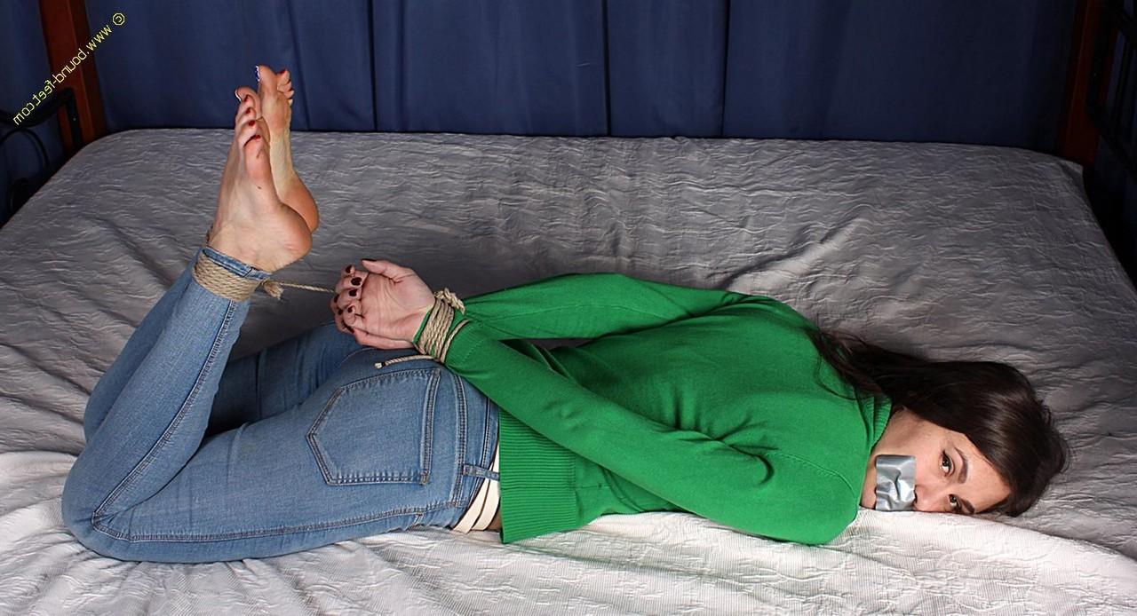 16P Girl next door type finds herself hogtied while silenced with duct tape