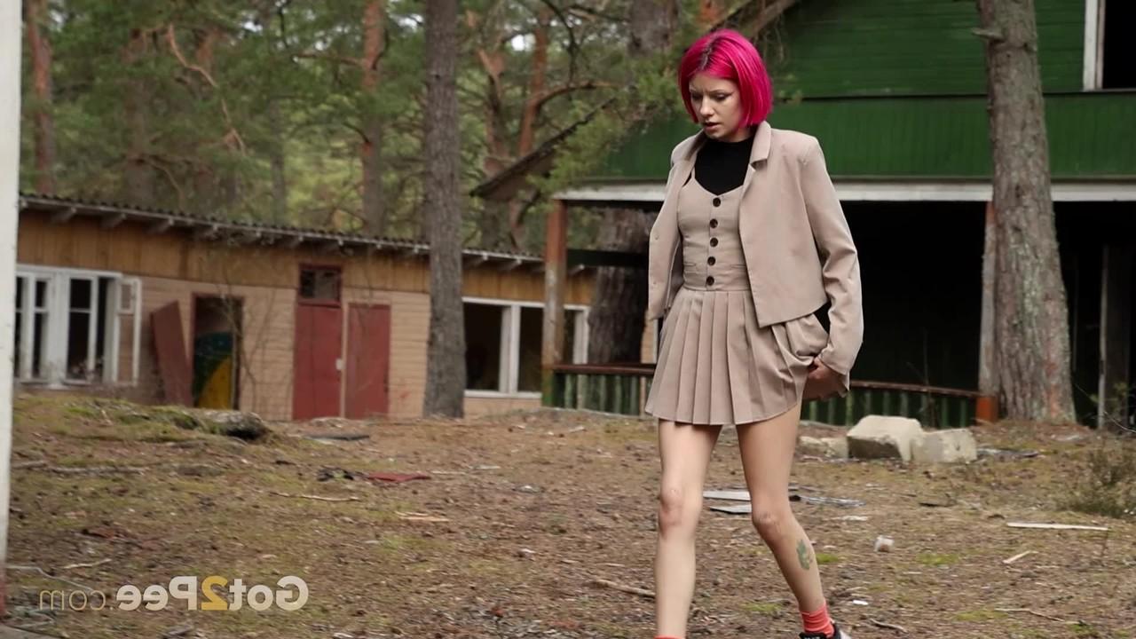15P Vasya pulls down her panties while taking an outdoor piss in a miniskirt