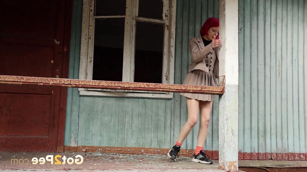 15P Vasya pulls down her panties while taking an outdoor piss in a miniskirt