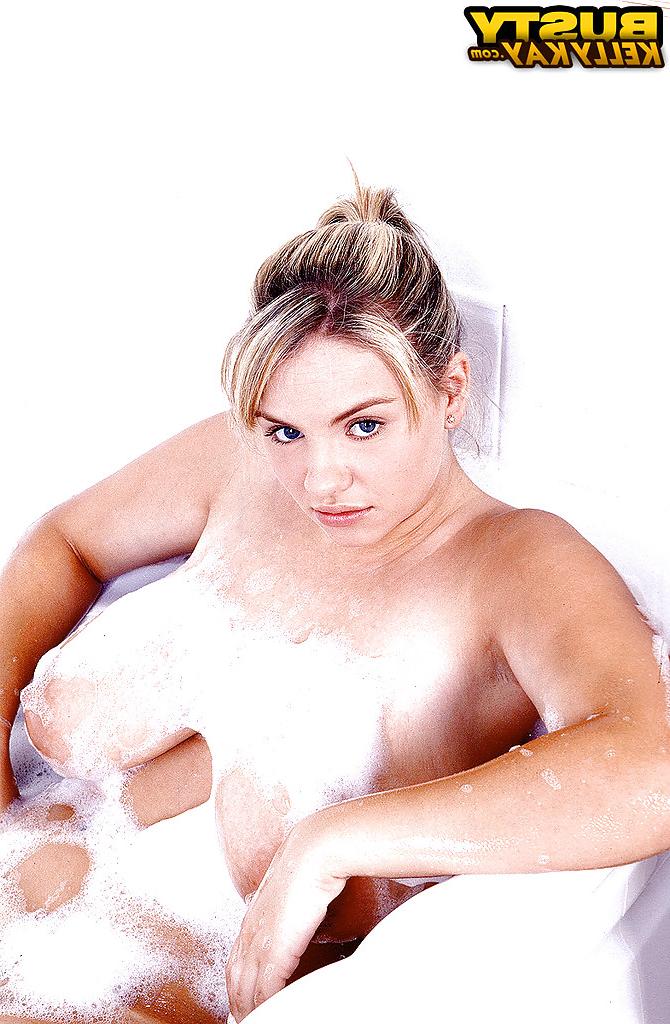 16P Plump Euro babe Kelly Kay soaps up huge pornstar juggs in bathtub