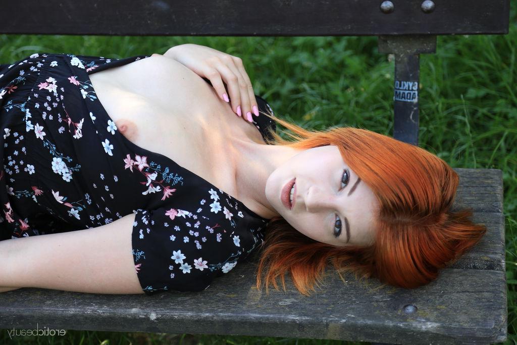 16P Young redheaded Nessie Blue gets totally naked on a riverside bench