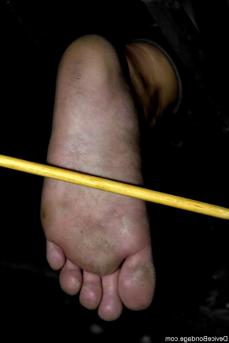 20P Caged MILF with big boobs Claire Dames has her feet caned & her nips clamped