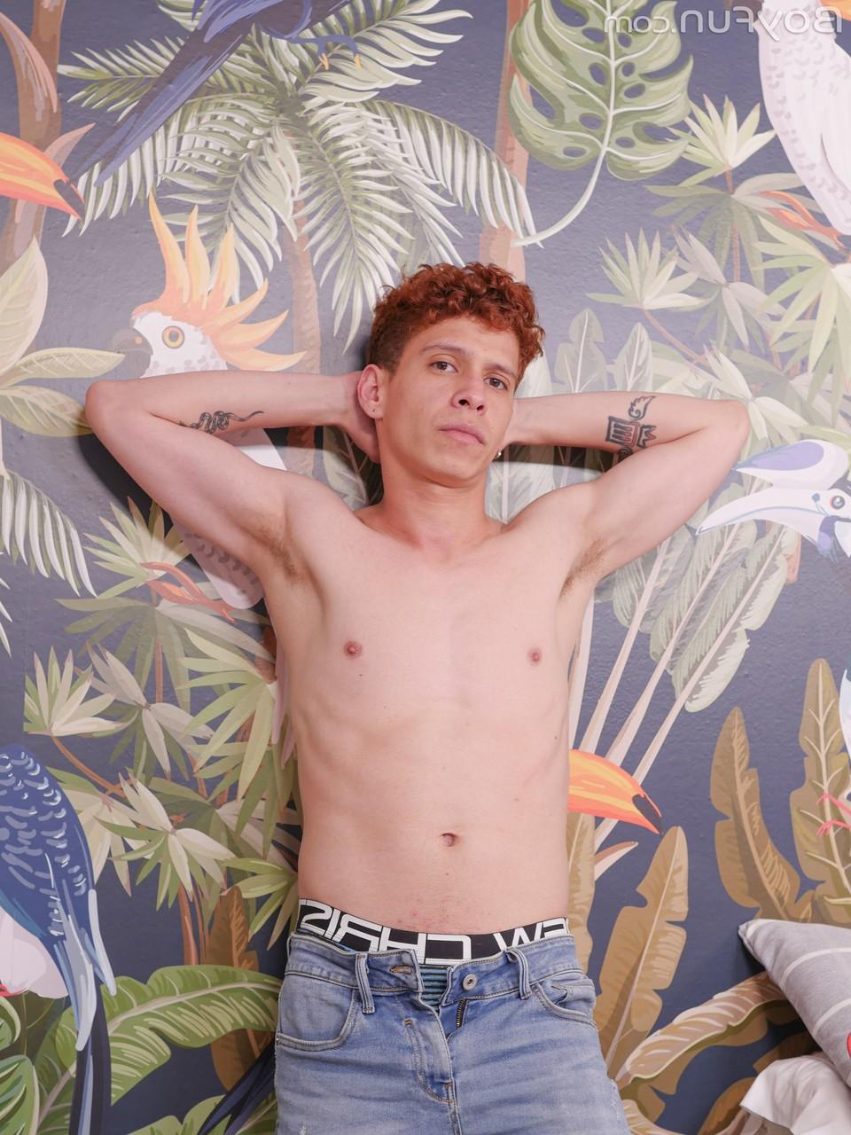 20P Redheaded gay Manu Cobre shows off his shaved dick after a hot striptease