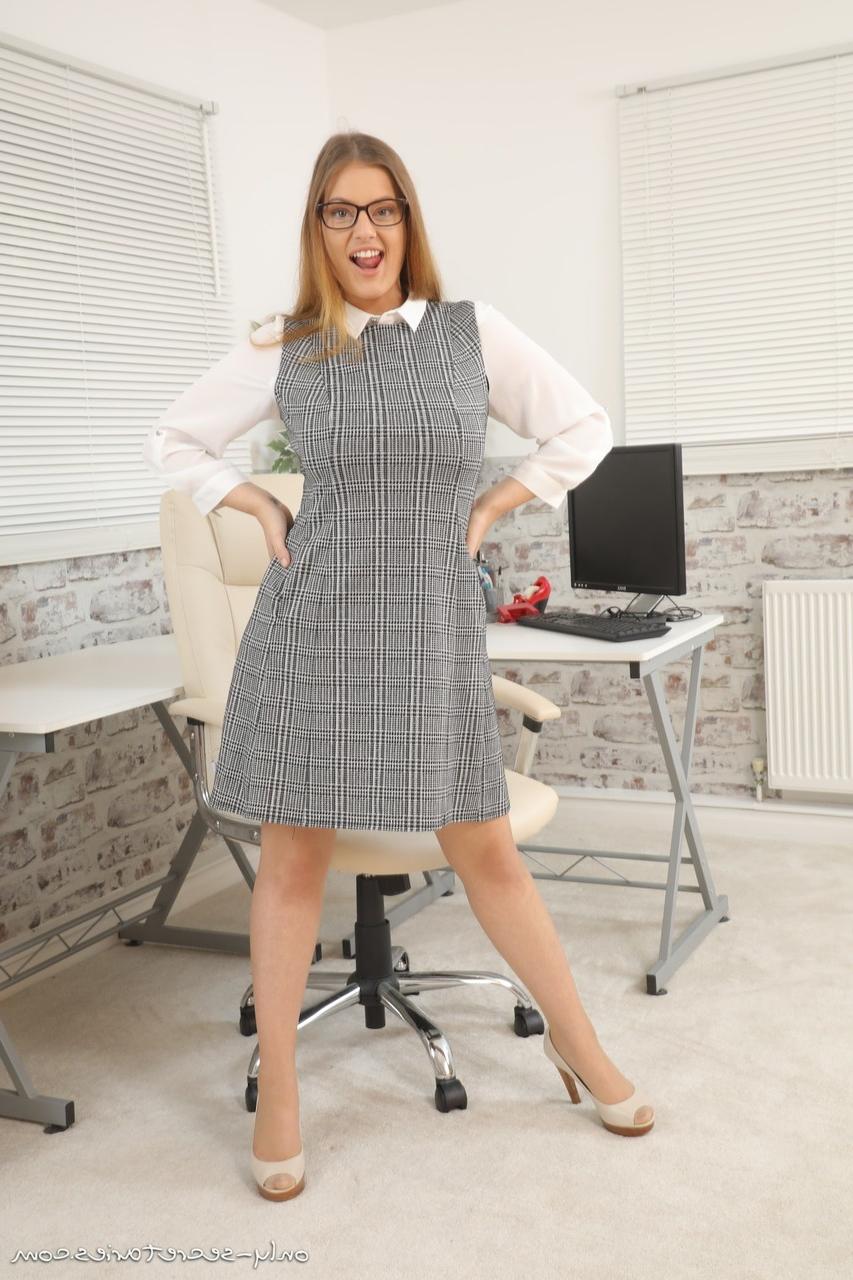 16P Redheaded secretary Lottii Rose unveils her big tits in glasses and pantyhose