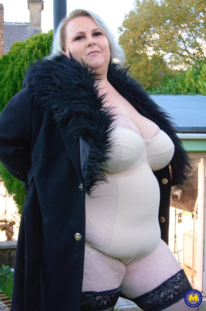 11P Older SSBBW masturbates on a sofa with sexual aids in stockings