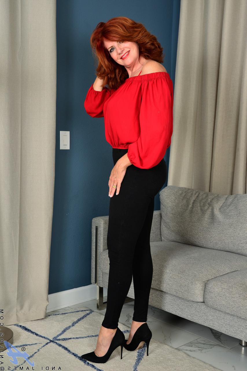 20P Mature ginger Andi James strips and shows her juicy boobs & fuzzy snatch